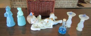 lot 305 image: Blue lady statue avon perfume bottles qty 2,  frosted glass bird bath avon perfume bottles qty2, wicker basket , porcelain baby and dog one of her arms are broke off