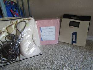 lot 331 image: bathroom scale, new set of queen sheets and a full size heating blanket