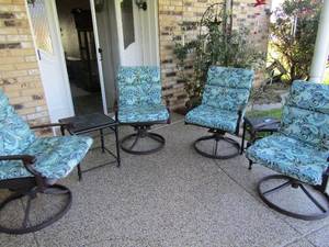 lot 338 image: Set of  4 outdoor patio chairs with cushion, swivel and rock, comes with small black table