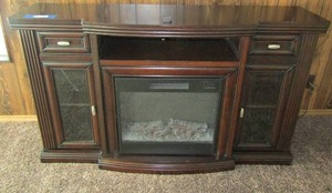 lot 30 image: Solid wood electric fire place dark cherry wood like new, 39 12 60 15 34