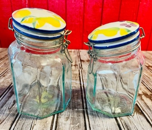 lot 60 image: Two Vintage Unique Glass Canisters Made in Italy