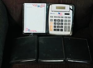 lot 81 image: Four Big Digit Electronic Calculators W Case &amp Notepad