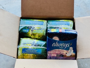 lot 91 image: One Box of Three Sized Medium Wellness Absorbent Underwear Packages &amp One Package of Always Maxi Pads