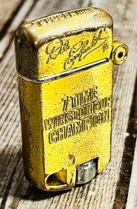 lot 24 image: Vintage Gold Toned Dale Earnhardt The Intimidator Commemorative Lighter