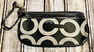 lot 45 image: Black W White Letters Coach Clutch Purse