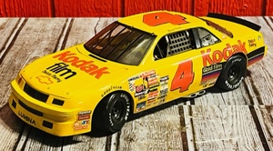 lot 211 image: Ertl American Muscle Collectors Edition #4 Ernie Irvan 118th Scale Kodak Film NASCAR Race Car