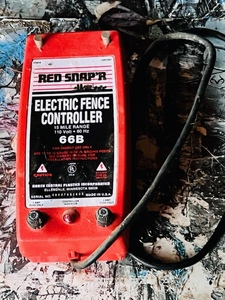 lot 45 image: Red SnapR 15 Mile Range Electric Fence Controller # 66B