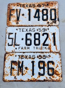 lot 180 image: Three 1957-1959 Texas Car &amp Truck License Plates