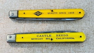 lot 213 image: Two Vintage Castle Seed Advertising Pocket Sawblade Knives
