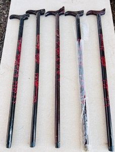 lot 246 image: Five Red &amp Black Oriental Design Snake Head Walking Canes