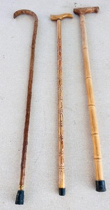lot 247 image: Three Vintage Elegant And Beautifully Hand-Crafted Wooden Canes - Including Twisted Wood &amp Bamboo