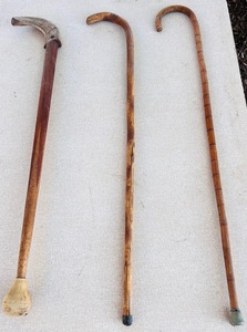 lot 248 image: Three Handcrafted Vintage Wooden Walking Canes - Inluding Rams Horn &amp Pool Cue &amp Snakes Head