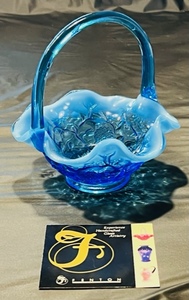 lot 15 image: Unique Fenton Blue Glass Basket With White Rim