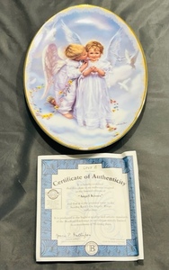 lot 40 image: Vintage Bradford Exchange Limited Edition Angel Kisses, On Angels Wings Collection, by Sandra Kuck 1st Issue