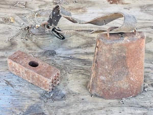 lot 102 image: Vintage Cow Bell &amp Hammer Head
