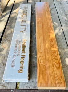 lot 164 image: One Box of Resilient Tranquility TRQ XD Rail Tie Oak 4mm Click Resilient Laminate Flooring &amp Stack of Unbranded Laminate Flooring