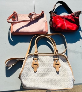 lot 93 image: Two Dooney Burke Purses &amp One Gianibernini