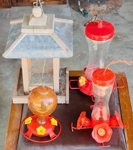 lot 95 image: Three Hummingbird &amp One Bird Feeder