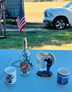 lot 124 image: Bradford Exchange A 6420 Keeping Them Safe First Issue in Wings of Protection, Marine Coffee Cup, USMC Light Up Wine Bottle WFlag, &amp Pearl Harbor Coffee Cup