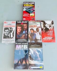 lot 190 image: Six New In Plastic Wrap Popular VHS Movies W Maxwell VCR Head Cleaner