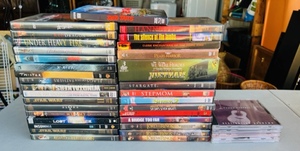 lot 191 image: 30 Popular Titles DVDs &amp 4 CDs