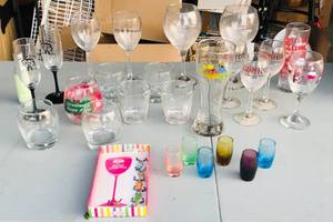 lot 226 image: Lot of 25 Tumblers, Wine, Champagne, &amp Shot Glasses WBox of Wine Charms - Tumblers Include Crown Royal Black, OMaras, &amp Chivas