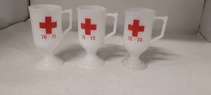 lot 61 image: Red Cross milk glass - Vietnam Era