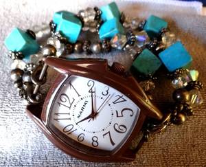 lot 36 image: NARMI WOMENS WATCH WITH TURQUOISE STYLE BAND - MODEL 3382C