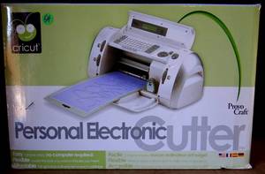 lot 54 image: Cricut CRV001 Personal Electronic Cutter wGeorge & Basic Shapes Font Cartridge - IN BOX