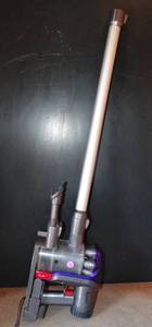 lot 149 image: DYSON PORTABLE STICK VACUUM WITH CHARGER & BRUSH