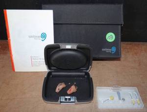 lot 153 image: 1 PAIR - UNITRON HEARING AIDS WITH CASE - SEE PIC 3 & 4 FOR ACTUAL MODEL NUMBERS