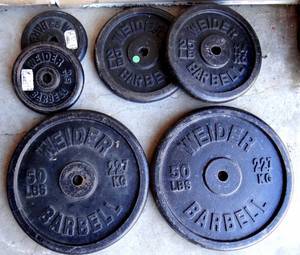 lot 279 image: WEIDER BARBELL WEIGHTS - 2 X 50, 2 X 25, 2 X 4.5 - 159 POUNDS TOTAL