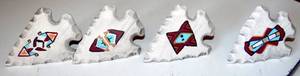 lot 84 image: LOT OF 4 - HANDMADE 2X UTE, 1 BLACKFOOT, 1 X ARAPAHO TRIBE ARROWHEAD NAPKIN HOLDERS - HAND PAINTED