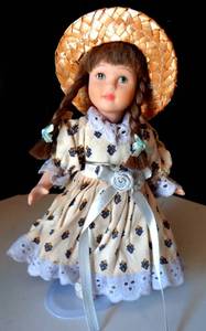 lot 87 image: SMALL UNMARKED PORCELAIN DOLL