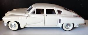 lot 125 image: White 1948 Tucker Torpedo Metal Die-Cast 118 Scale Model - Road Legends Yatming