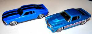 lot 132 image: 1969 CHEVY CAMARO & 1970 FORD MUSTANG DIE CAST 143 SCALE