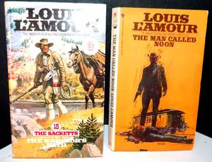 lot 183 image: PAIR OF LOUIS LAMOUR PAPERBACK BOOKS