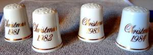 lot 201 image: AVON CHRISTMAS THIMBLES - 1981, 1982, 1983, & 1984