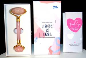 lot 228 image: ROSELYN BOUTIQUE MAGIC IS REAL ANTI AGING FACE ROLLER - NEWOPEN BOX FOR PIC