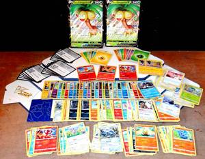 lot 237 image: LARGE COLLECTION OF 2022 POKEMON CARDS INCLUDING BASE, HOLO, OVERSIZED, ENERGY CARDS AND MORE - 150 CARDS 