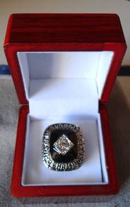 lot 255 image: OAKLAND RAIDERS AFL CHAMPIONSHIP RING IN CUSTOM WOOD BOX - DARYL LAMONICA COACH EDITION $$