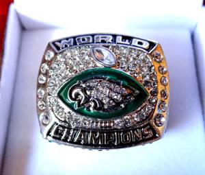 lot 259 image: 2017 PHILADELPHIA EAGLES SUPERBOWL CHAMPIONSHIP RING IN CUSTOM WOOD BOX - NICK FOLES EDITION $$