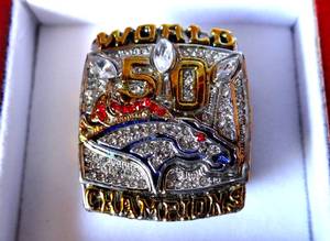 lot 260 image: 2015 DENVER BRONCOS SUPERBOWL CHAMPIONSHIP RING IN CUSTOM WOOD BOX - PEYTON MANNING EDITION $$