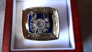 lot 265 image: 1970 BALTIMORE COLTS SUPERBOWL CHAMPIONSHIP RING IN CUSTOM WOOD BOX - JOHNNY UNITAS EDITION $$