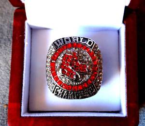lot 266 image: BOSTON REDSOX WORLD CHAMPIONSHIP RING IN CUSTOM WOOD BOX - ANDREW BENINTENDI EDITION $$
