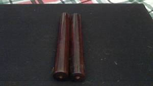 lot 11 image: Pair of vintage wood claves.  Look like Rosewood