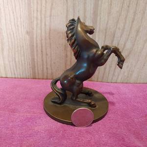 lot 66 image: 4.5 tall horse sculpture.  possibly bronze.  very heavy for size