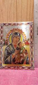 lot 170 image: tin religious wall hanging