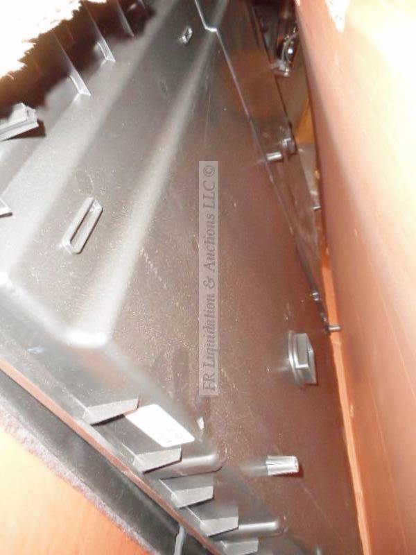 lot 107 image: Genuine GM Cadillac storage compartment