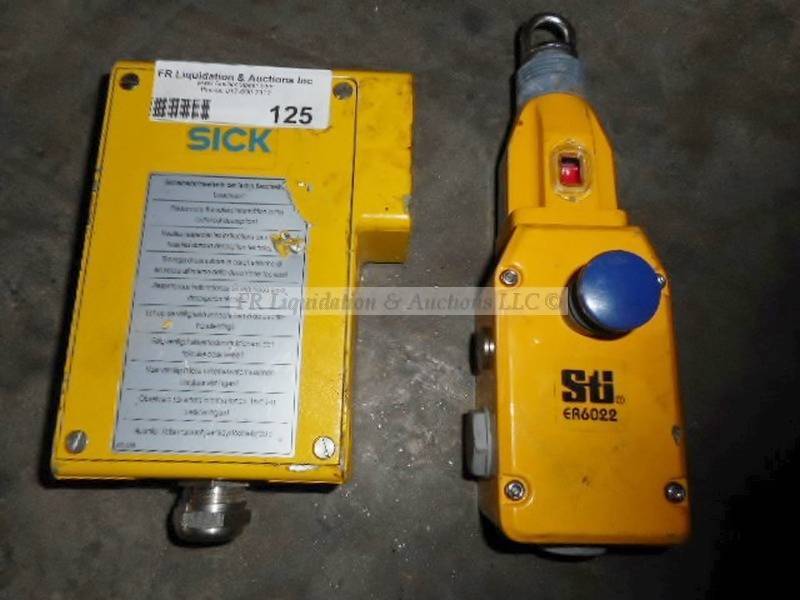 lot 125 image: Safety interlock switch and photo electric safety switch